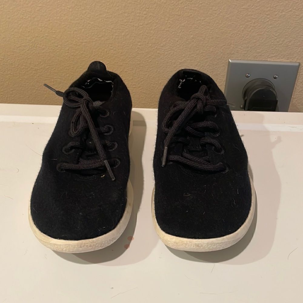 AllBirds wool black tennis shoes. They are a woman’s size 8